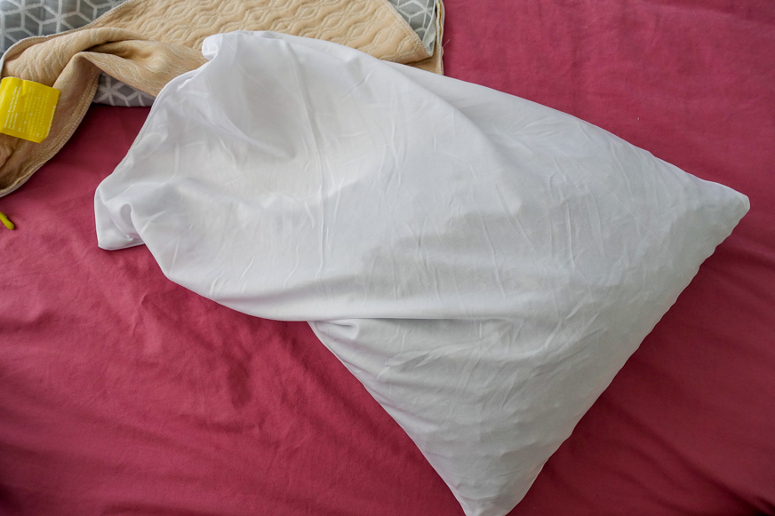 brightr luna adjustable memory foam pillow filling to one side